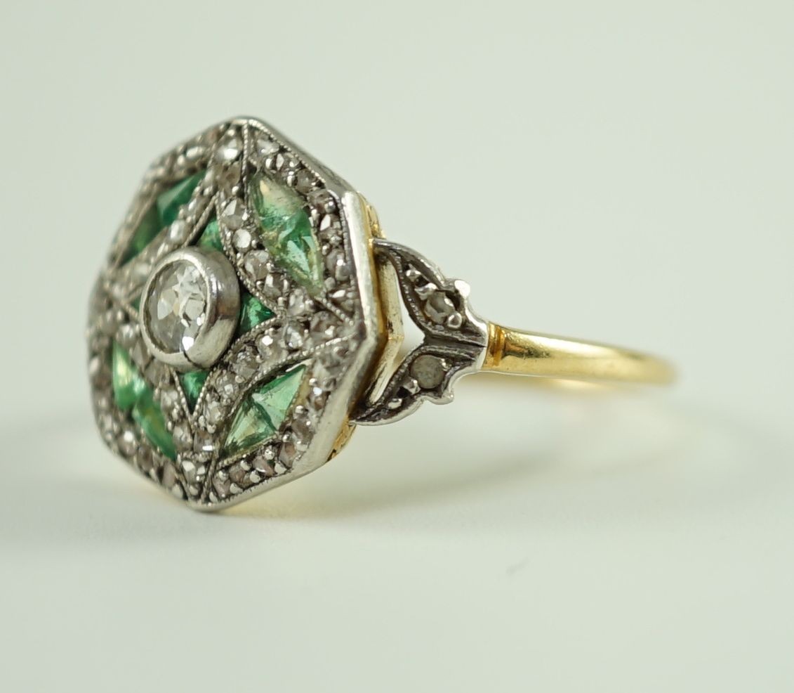 A Belle Epoque gold, emerald and diamond cluster set octagonal dress ring